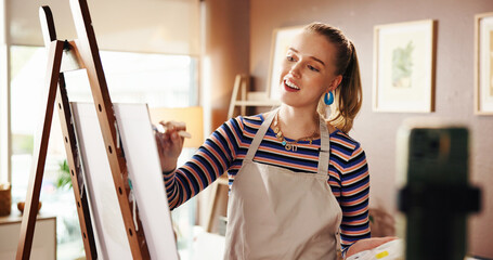 Painter, canvas or phone for recording a video in home studio for painting process, advice or tips....