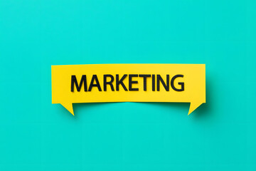 A yellow speech bubble with the word marketing on a teal background creates a vibrant message