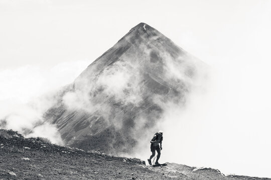 One man hikes on a high altitude trail at Volcan de Fuego