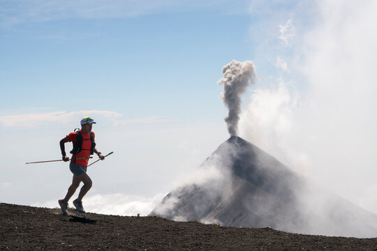 One man running on a high altitude trail at Volcan de Fuego