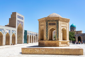 Inner courtyard of Kalon Mosque in Bukhara, Uzbekistan with brick pavilion and turquoise dome