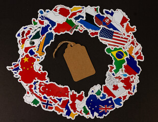 Blank Brown Tag Label Surrounded by Colorful World Country Flag Stickers