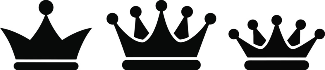 Vector art of three black crowns of varying sizes
