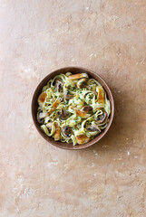 Fettuccine pasta with chicken and mushrooms in creamy sauce. Italian cuisine. Recipe.