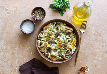 Fettuccine pasta with chicken and mushrooms in creamy sauce. Italian cuisine. Recipe.
