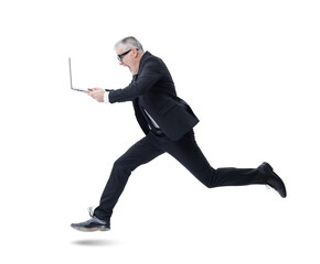 Side view of a businessman holding a laptop, running in fear and screaming, isolated on white...
