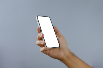 Man holding phone blank outdoor on a white wall. Phone mockup