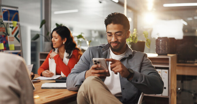 Creative man, meeting and message in office for graphic design, planning and research. Digital agency, communication and employee with tech, social media and ideas for website, UI project or homepage