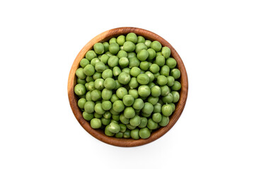 Green peas in wooden bowl isolated on white background.