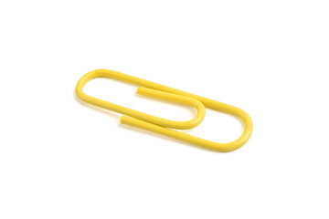 Obraz premium Yellow paper clip isolated on white background