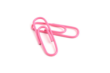 Two pink paper clips isolated on white background