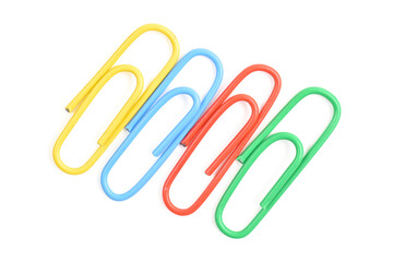 Collection of colorful paper clips isolated on white background, top view