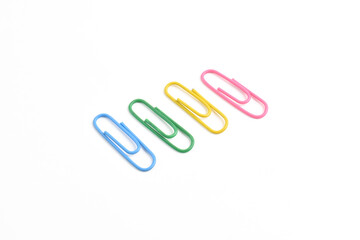 Colorful paper clips isolated on white background