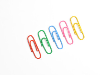 Colorful paper clips isolated on white background