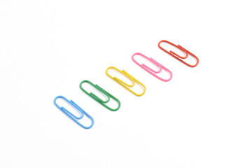 Colorful paper clips isolated on white background