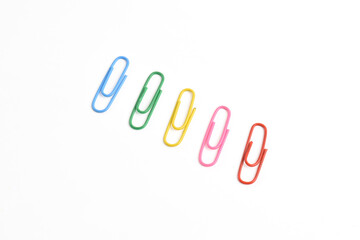 Colorful paper clips isolated on white background