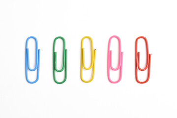 Colorful paper clips isolated on white background
