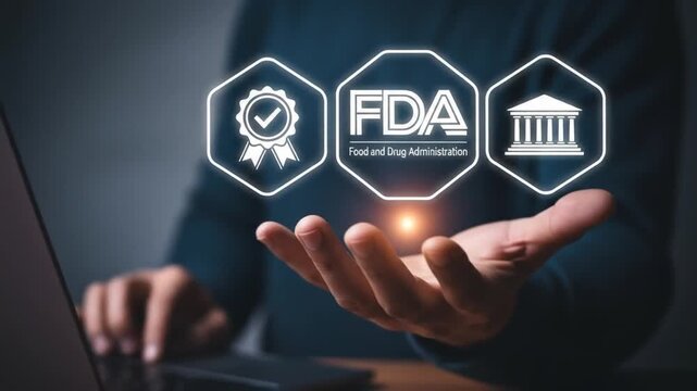 FDA Approved Food and Drug Administration concept. Businessman using laptop with FDA icon on virtual screen for Health product standards control system.
