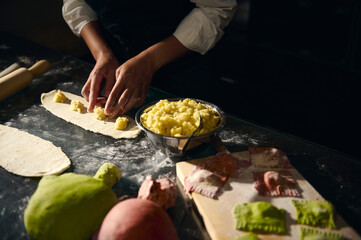 Chef Preparing Handmade Pasta Featuring Colorful Italian Flag-Inspired Dough