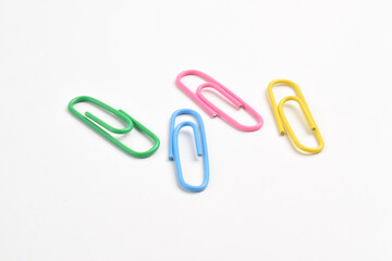 Colorful paper clips isolated on white background