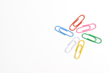Colorful paper clips isolated on white background