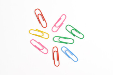 Colorful paper clips isolated on white background