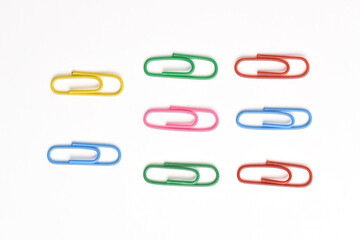 Colorful paper clips isolated on white background