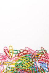 Colorful paper clips isolated on white background. Copy space. Copy space for your text and information