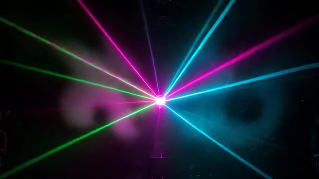 Vibrant Multicolor Laser Show with Radiating Beams and Particles in Energetic Club Atmosphere