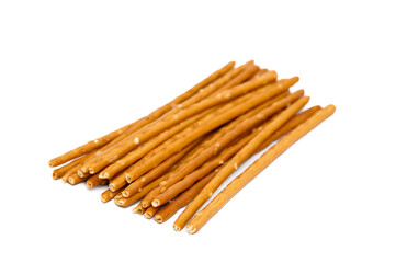 A stack of baked breadsticks with sea salt, a salty snack