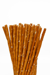 Macro shot, close-up of the structure of salty sticks, a bar snack for beer, salty sticks sprinkled with coarse salt