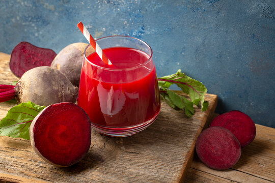Glass of fresh beetroot juice with vegetables - Powered by Adobe