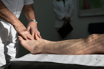 Fototapeta premium Doctors performing patient diagnostics with equipment