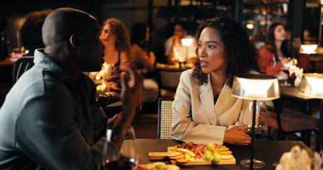Talking, date and food with couple in restaurant for conversation, bonding and fine dining chat....