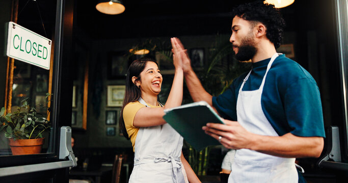 Happy people, team or tablet with high five in cafe for small business success together. Man, woman or employees in celebration with technology or smile for startup, profit or review in coffee shop
