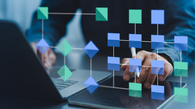 Concept illustration. data flow model. diagram. workflow. Businessman using data flow and workflow example with diagram showing on computer screen.