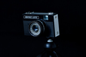 retro camera is displayed in an art museum
