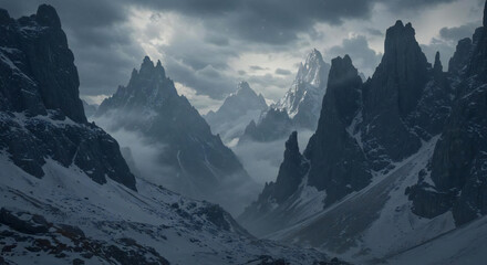 Obraz premium Dramatic Winter Mountain Landscape with Snow Covered Peaks and Cloudy Skies
