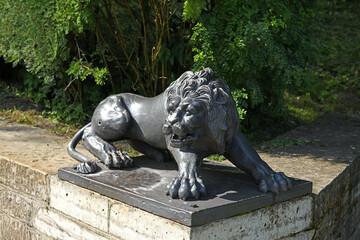 Statue of lion at bottom of Big Stone Staircase in Pavlovsk park, suburb of Saint Petersburg, Russia