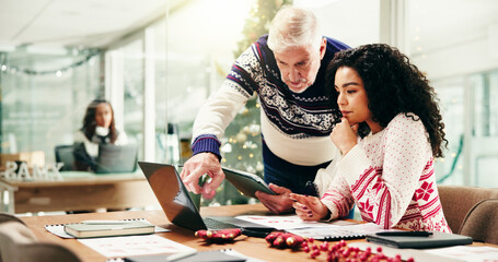 Christmas, laptop and business people in office, help and tablet with collaboration, feedback or...