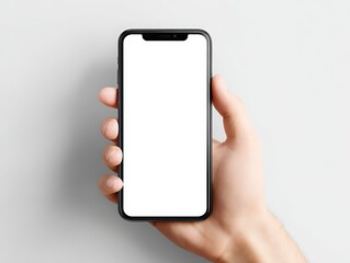 Human hand holding a modern black smartphone with a blank white screen against a plain light background