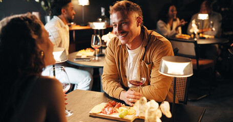 Love, wine and date with couple in restaurant for bonding, romance and fine dining at night....