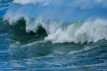 Powerful ocean waves crash along the Hermanus shoreline after a dramatic winter storm, capturing the raw energy and beauty of nature on the Whale Coast, Overberg, Western Cape, South Africa.