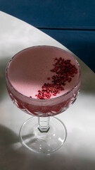 Frosted raspberry mousse in crystal goblet, evoking fairy tale teas and midsummer's eve enchanting flavors, crimson dreams unfurl