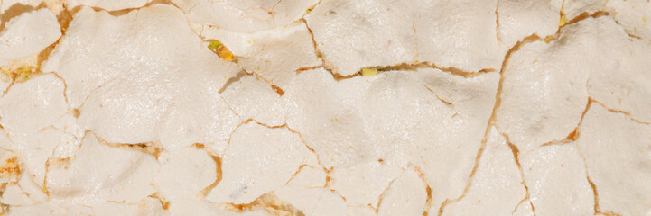 Cracked desert earth reminiscent of lunar landscapes, evoking World Soil Day contemplation, perfect...