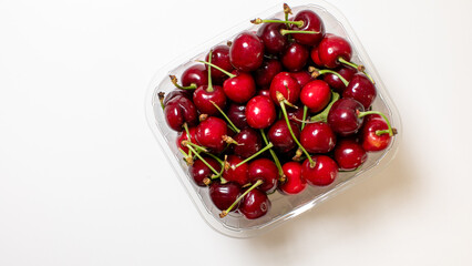 Glistening cherries cradle summer's abundance, evoking Hanami picnics and the mystical allure of cherry festivals worldwide