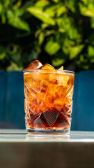 Amber-hued Negroni sparkles with citrusy whispers, perfect for sultry Aperitif Hour or Italy's...