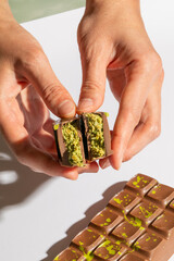 Indulge in creamy pistachio-filled dubai chocolate harmony, sweet tooth dreams, World Pistachio Day...