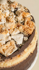 Golden-honeycomb topped chocolate cake whispers autumn equinox indulgence and cozy Hygge vibes in a deliciously textured panorama