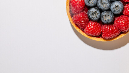 Juicy blueberries and raspberries nestle in halved grapefruit, evoking Berry Day and Citrus Celebration with vibrant zest